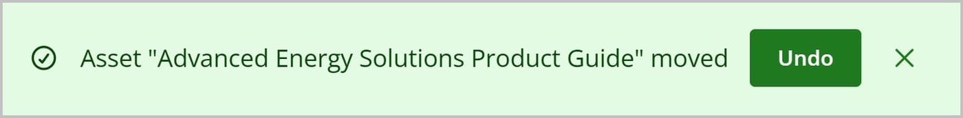 A green success message banner. The text reads Asset Advanced Energy Solutions Product Guide moved. A button that says Undo is displayed on the right.